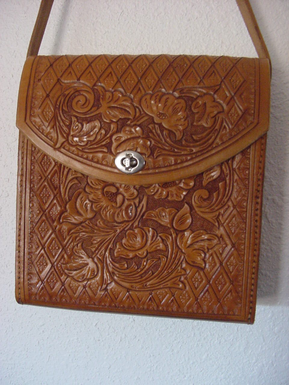 Floral carved purse 7X9X2 1/2    $85.00